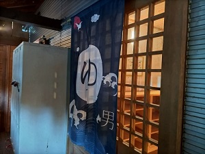 滝見苑けんこう村 ごりやくの湯 大浴場入り口の写真です